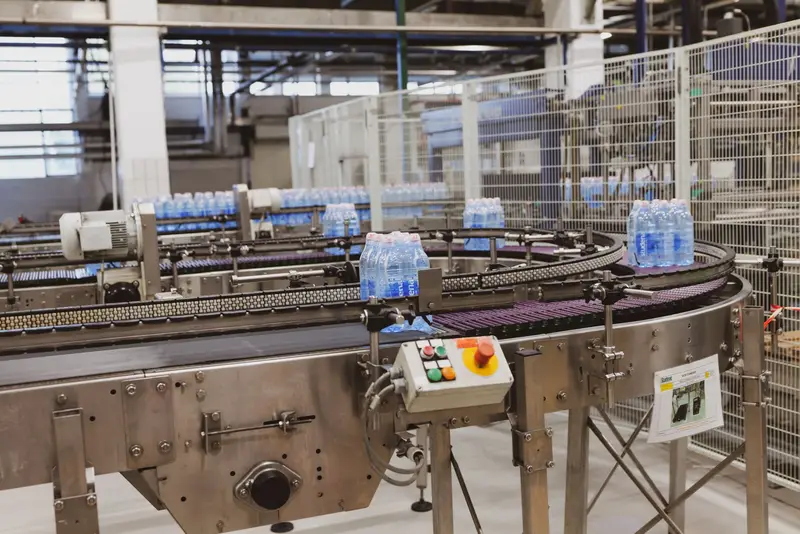Bottled water moving along an automated conveyor